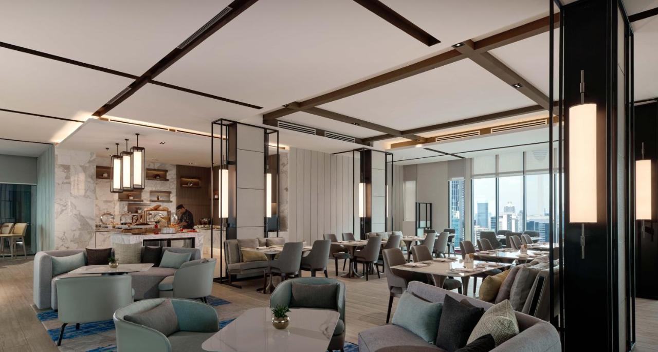 Pan Pacific Serviced Suites Kuala Lumpur Exterior photo The Club at Changi Airport