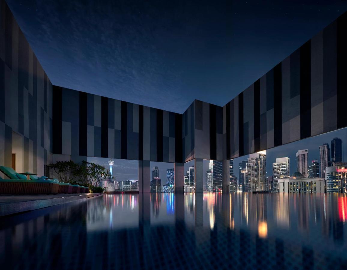 Pan Pacific Serviced Suites Kuala Lumpur Exterior photo The pool at the hotel